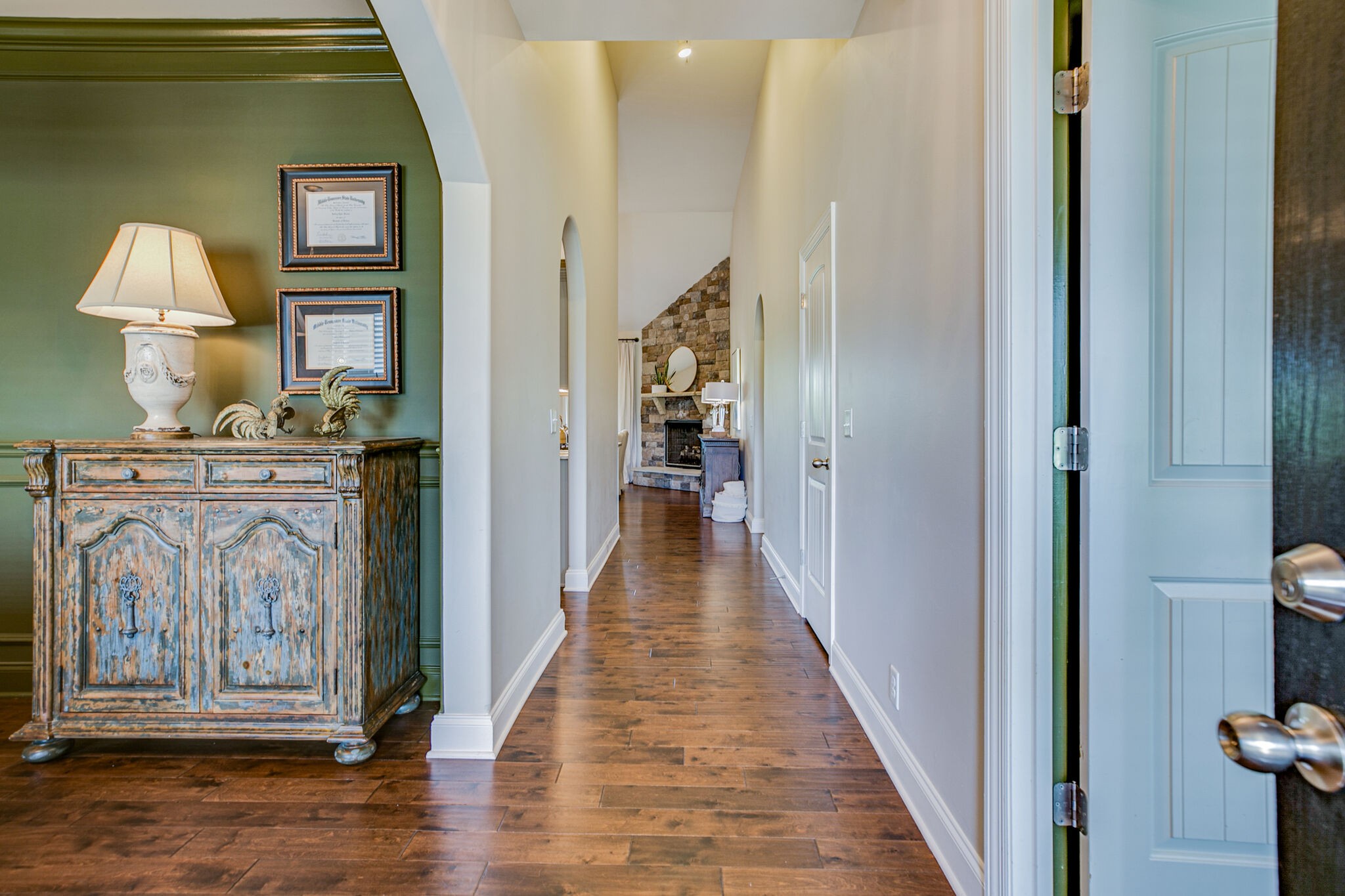 911 Contessa Drive Murfreesboro, TN 37128 - Photo 4 of 42 a view of a hallway with wooden floor and staircase