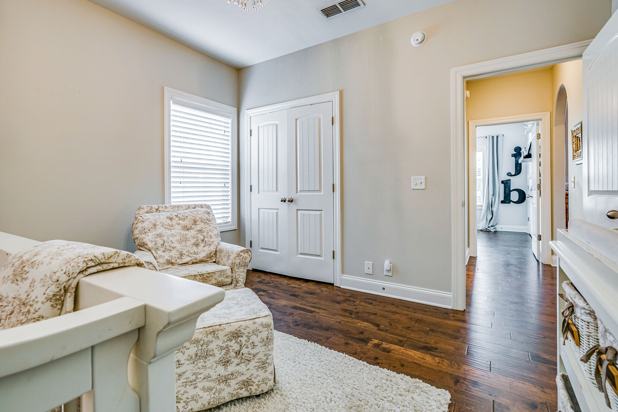 911 Contessa Drive Murfreesboro, TN 37128 - Photo 32 of 42 a bedroom with a bed and wooden floor
