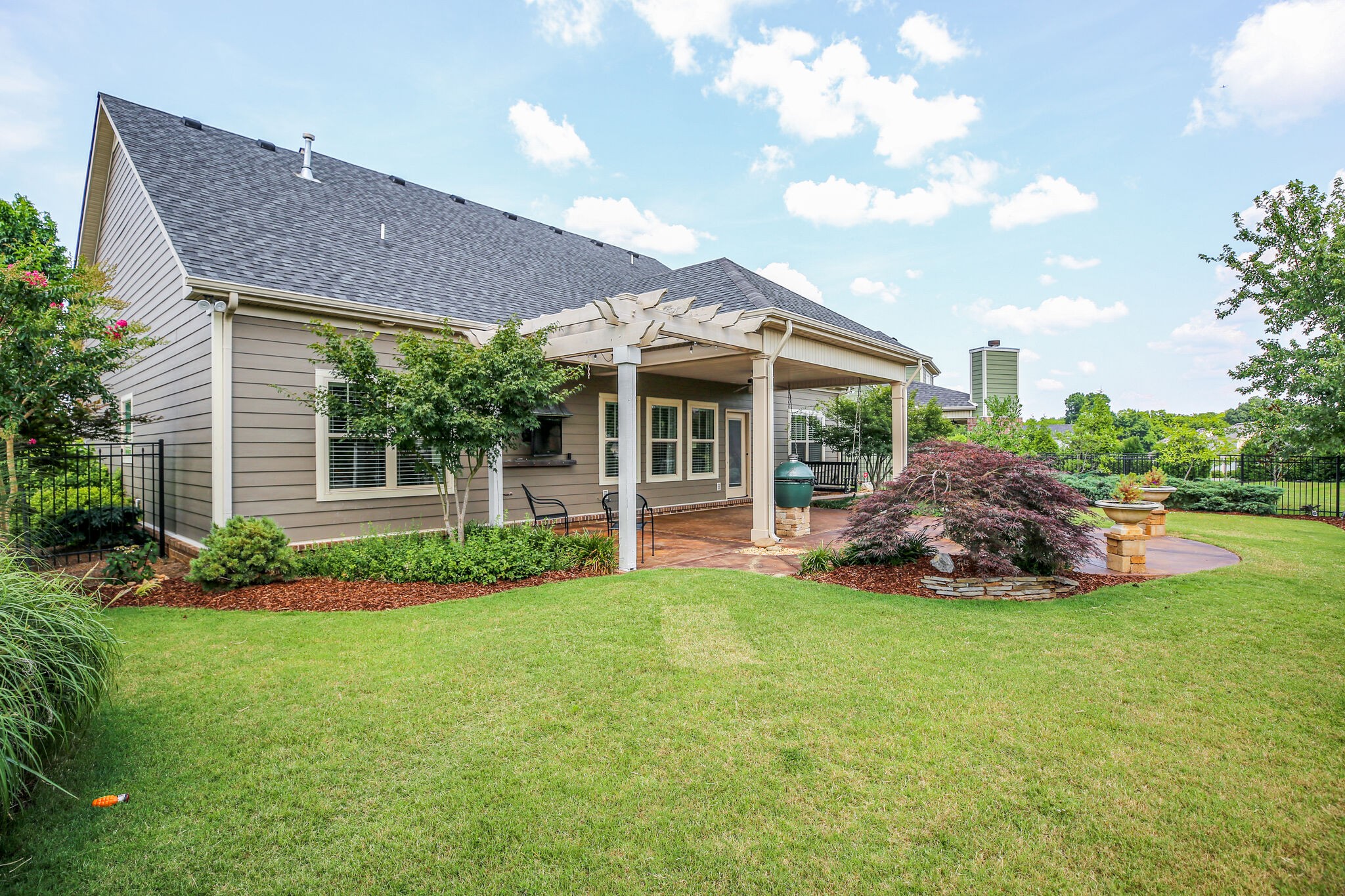 911 Contessa Drive Murfreesboro, TN 37128 - Photo 40 of 42 a view of a house with a yard and sitting area