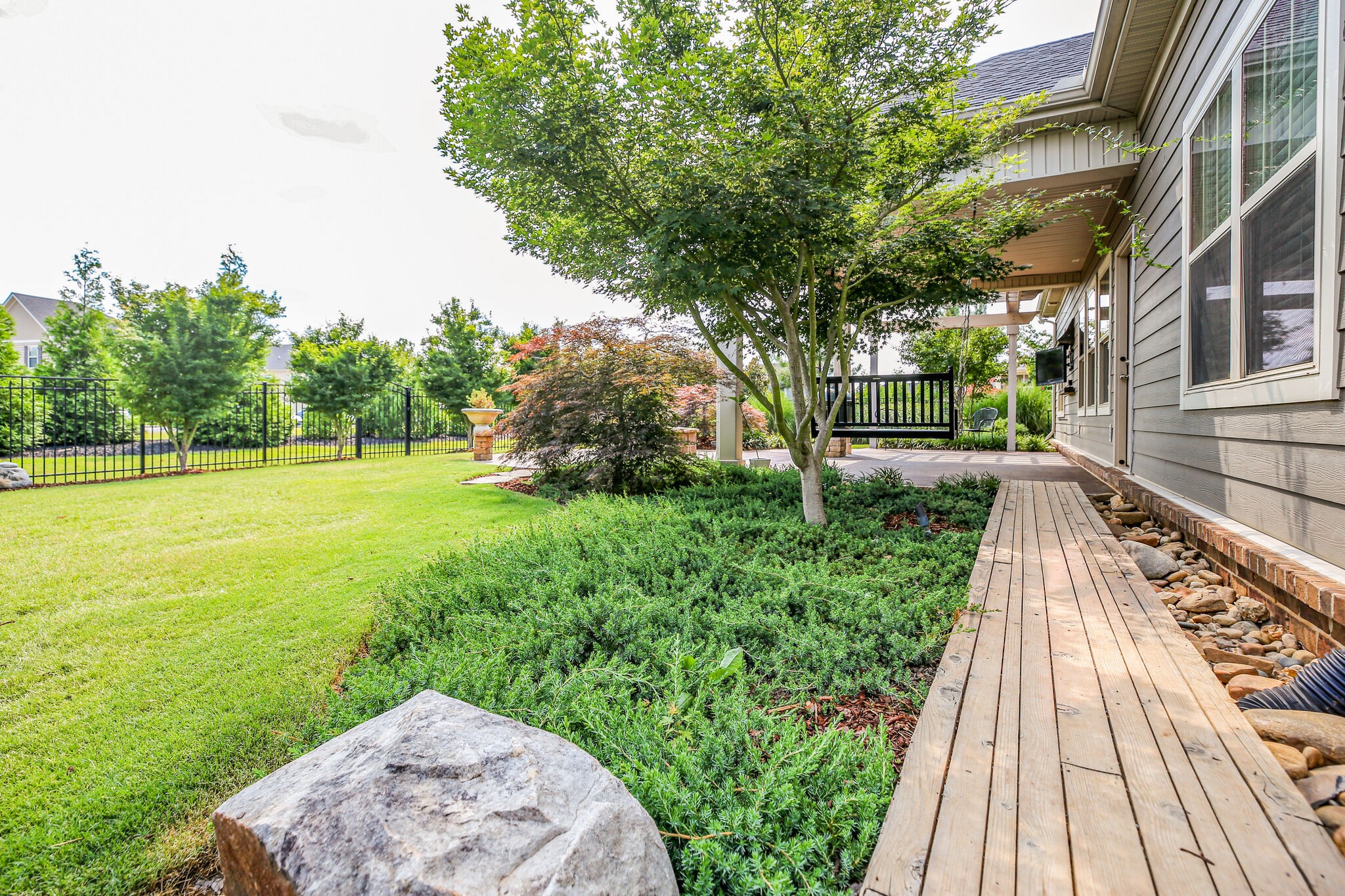 911 Contessa Drive Murfreesboro, TN 37128 - Photo 42 of 42 a view of a backyard with a garden