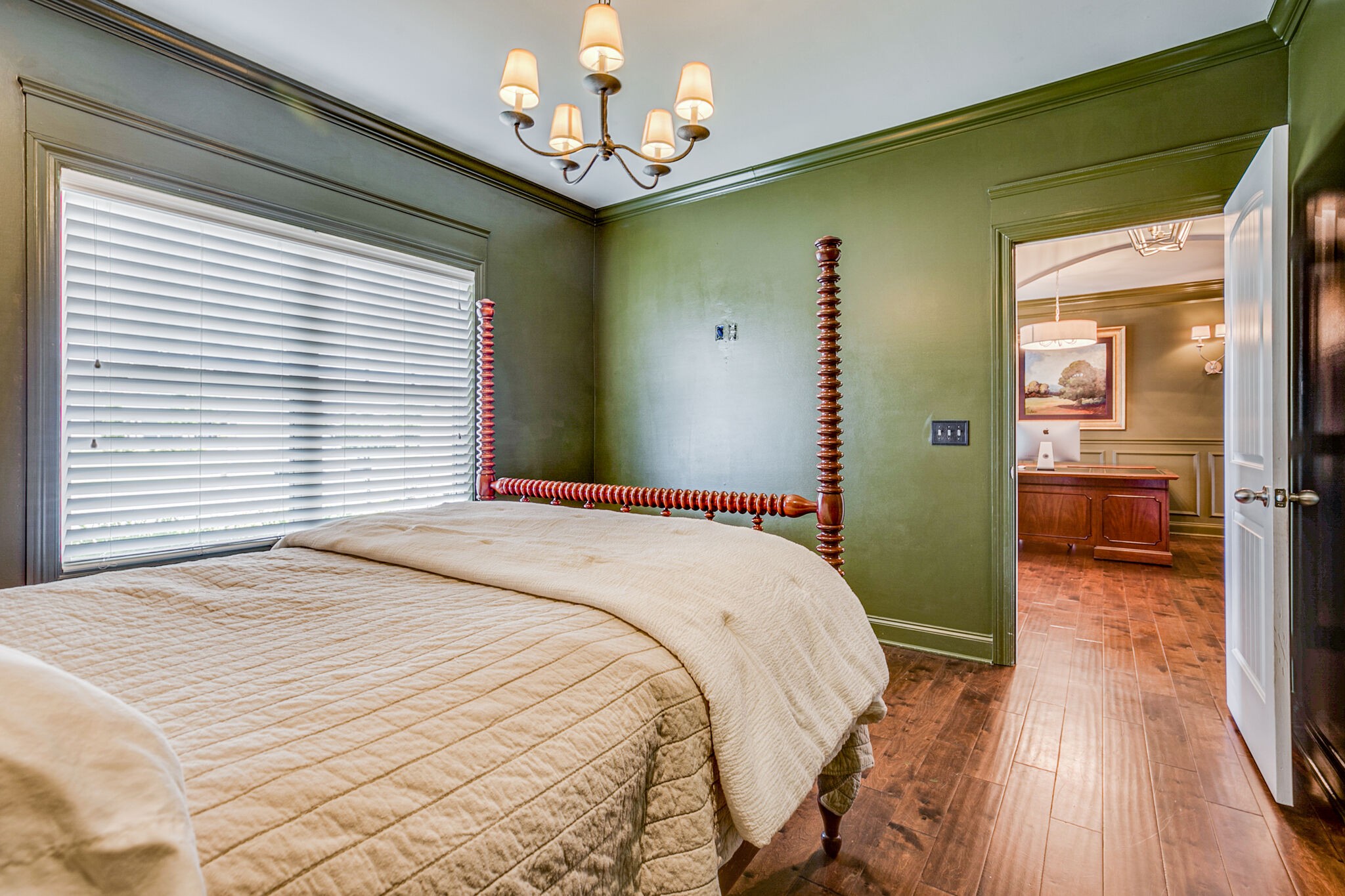 911 Contessa Drive Murfreesboro, TN 37128 - Photo 9 of 42 a bedroom with a bed and a chandelier