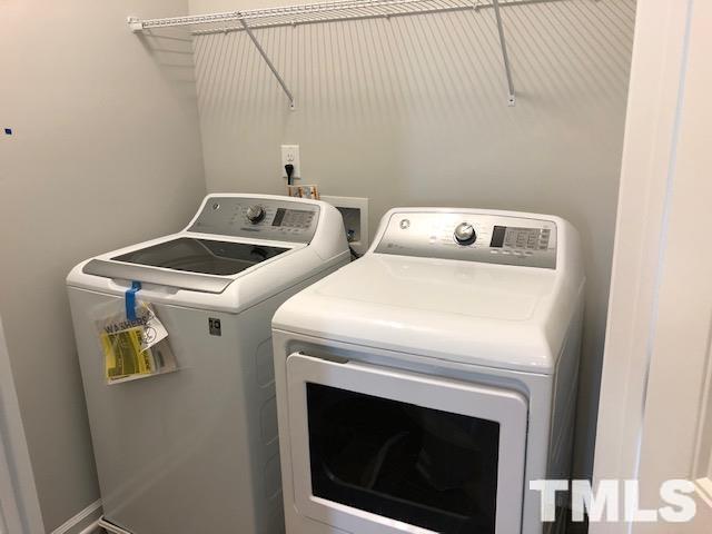 128 Katrine Way Raleigh, NC 27603 - Photo 19 of 19 a utility room with dryer and washer