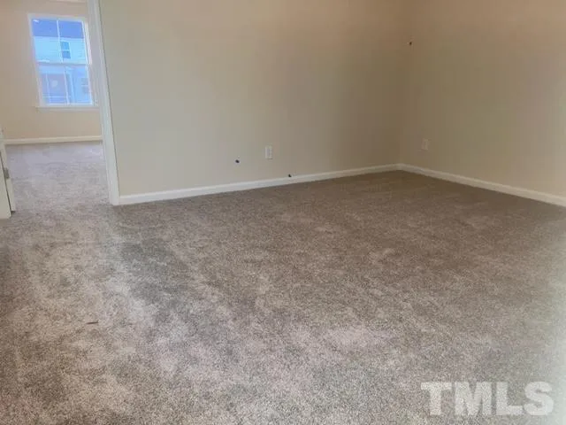 an empty room with a natural light