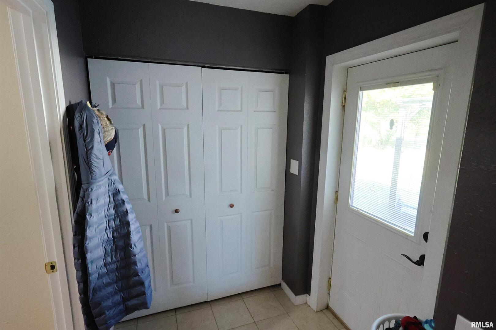 290 West 3rd Street Bonnie, IL 62816 - Photo 19 of 28 a view of a closet with wooden door