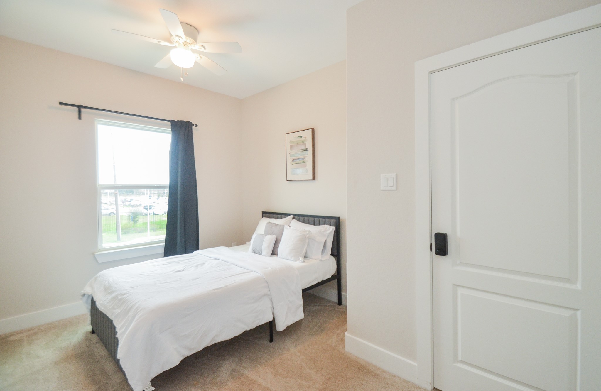 4511 Reed Road Houston, TX 77051 - Photo 22 of 39 a bedroom with a bed and a window