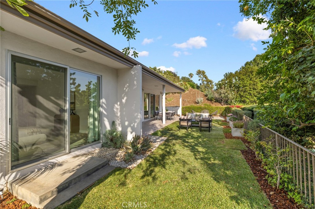 598 Camillo Road Sierra Madre, CA 91024 - Photo 66 of 75 a backyard of a house with table and chairs