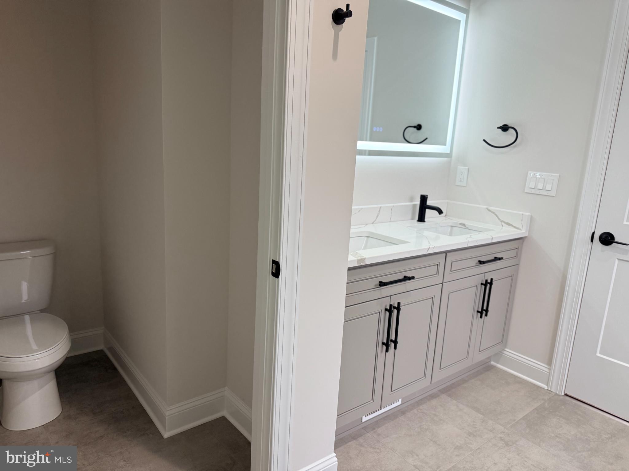 501 Gold Valley Road Locust Grove, VA 22508 - Photo 55 of 85 Sleek modern bathroom with elegant finishes.