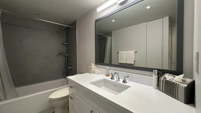 a kitchen with sink cabinets and refrigerator