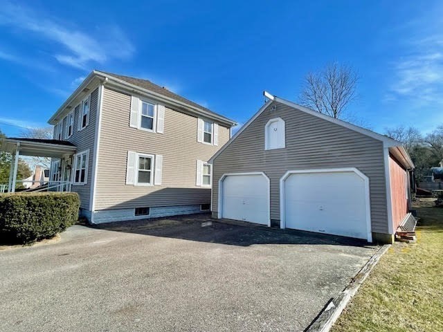 42 Smiths Lane Kingston, MA 02364 - Photo 2 of 39 a front view of a house with a yard