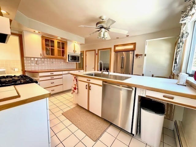 42 Smiths Lane Kingston, MA 02364 - Photo 6 of 39 a kitchen with stainless steel appliances granite countertop a sink and cabinets