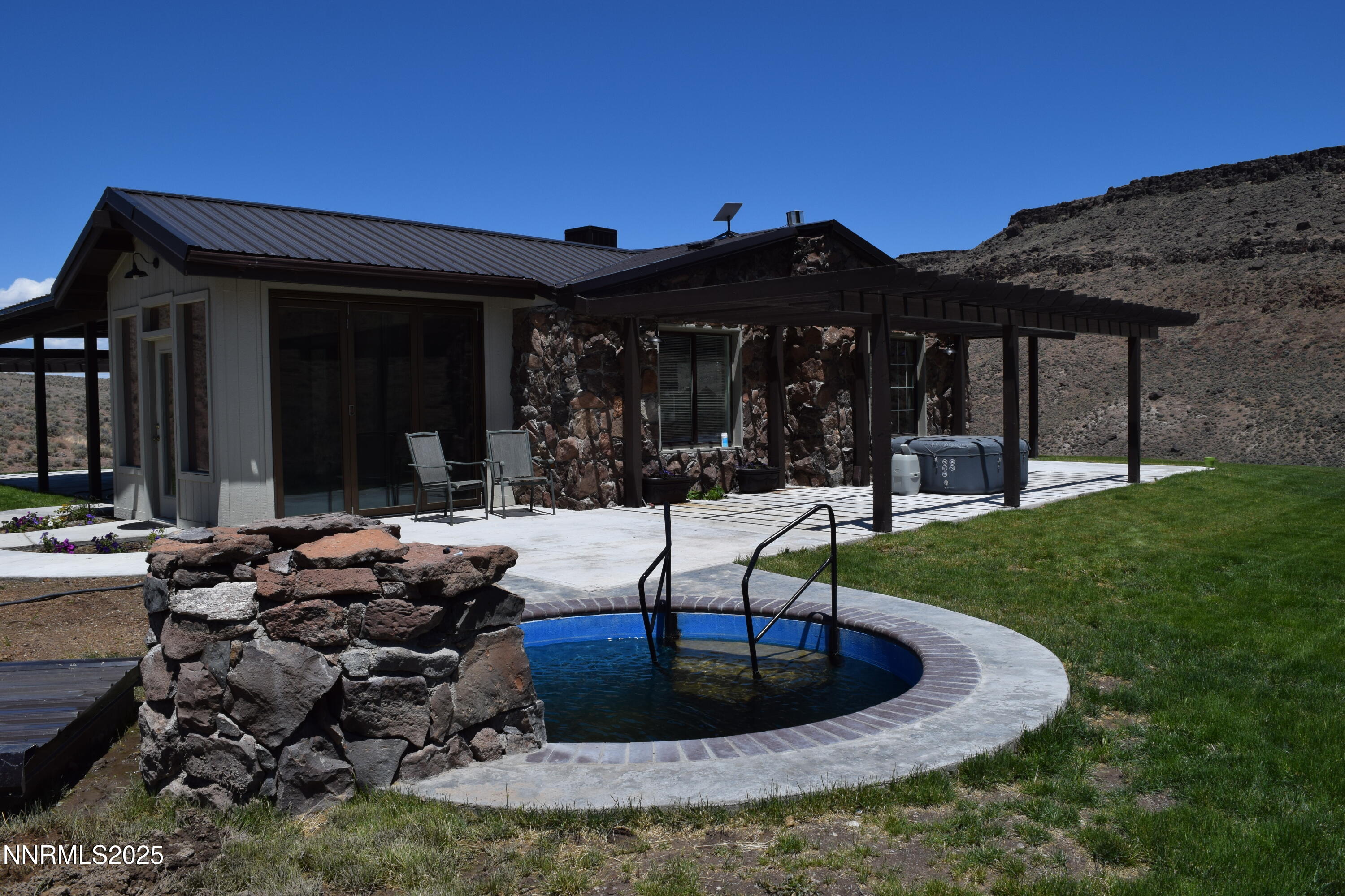 3300 High Rock Road Gerlach, NV 89412 - Photo 15 of 57 a view of a house with backyard and porch