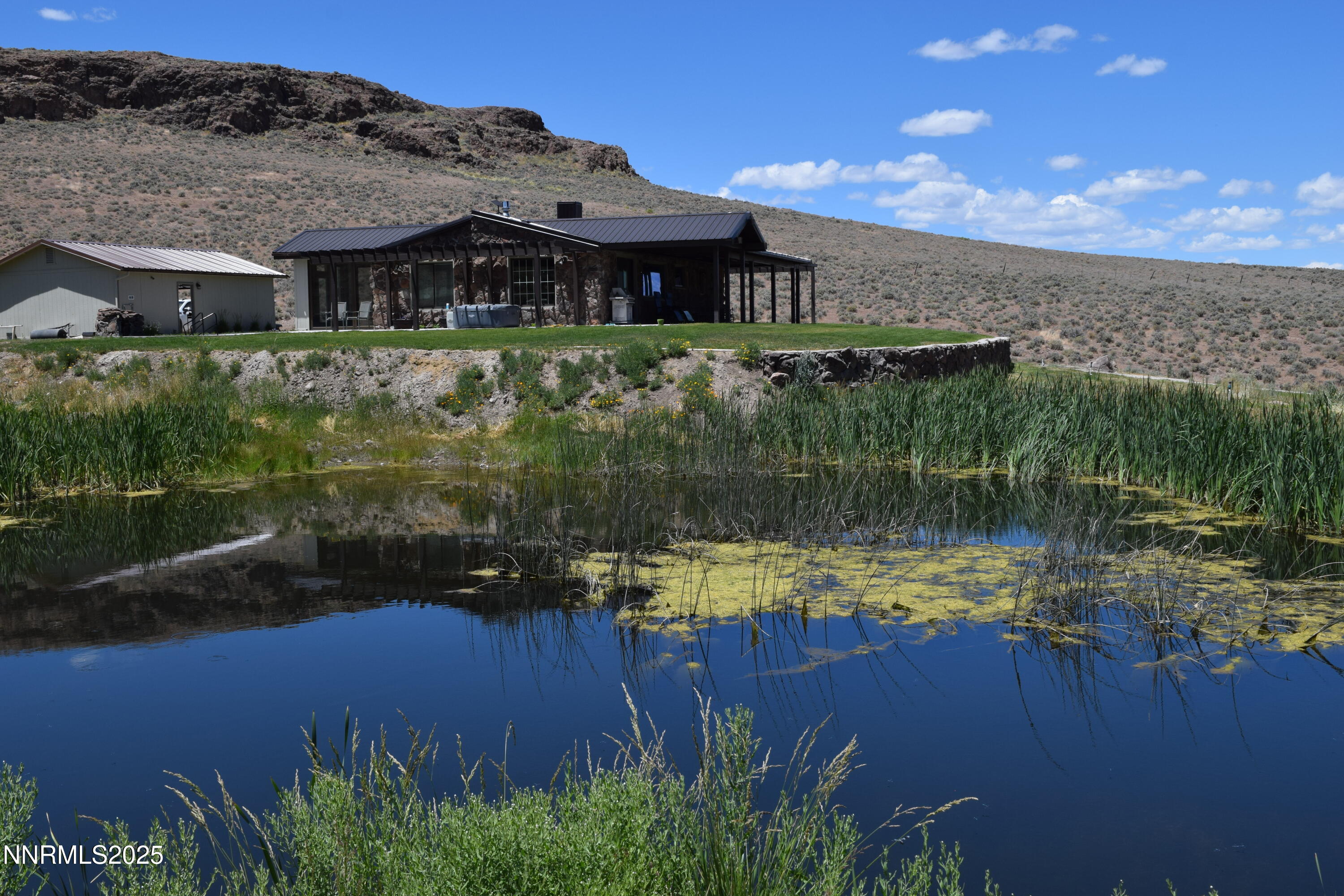 3300 High Rock Road Gerlach, NV 89412 - Photo 16 of 57 a view of a lake with a mountain in the background