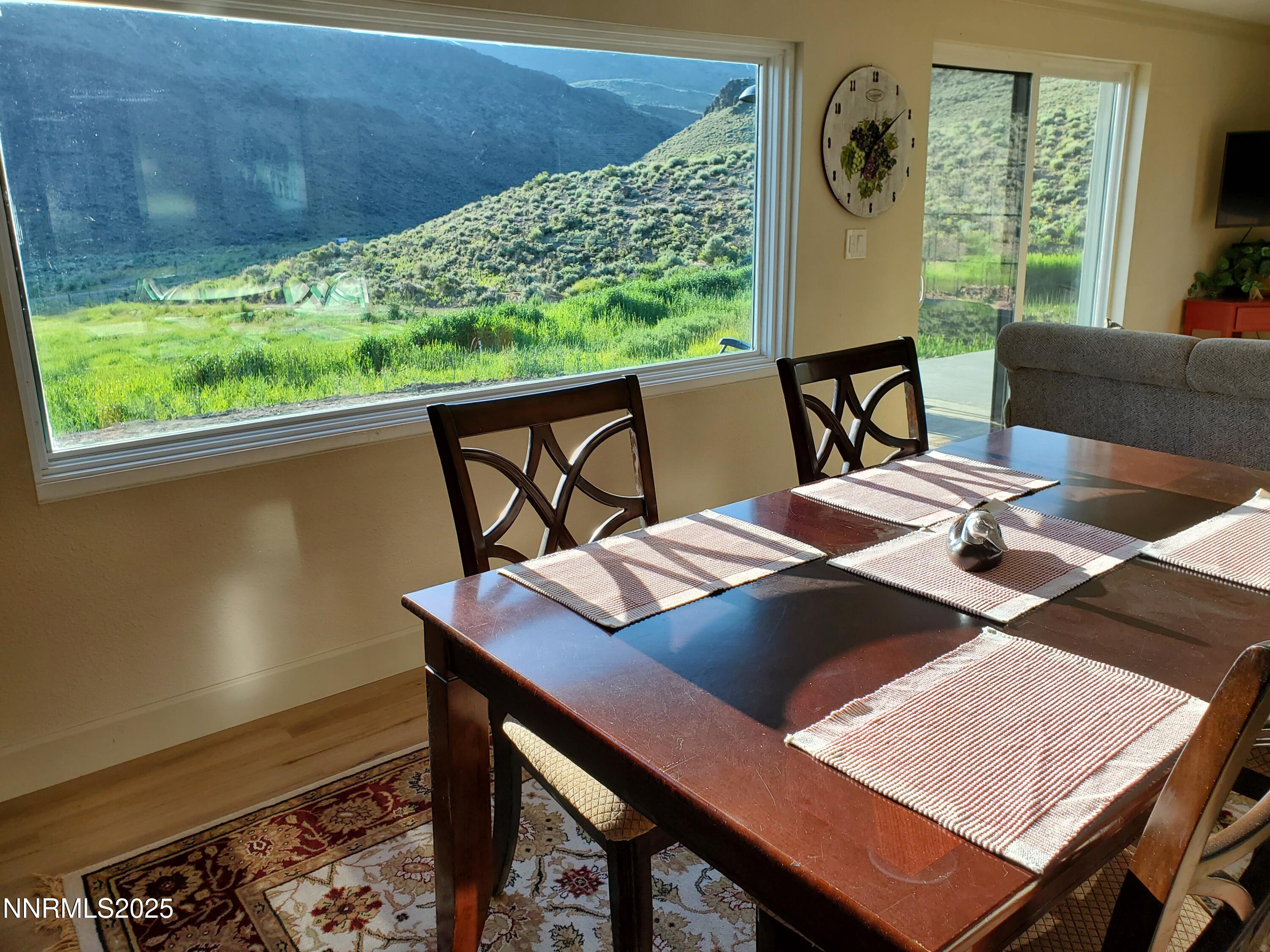 3300 High Rock Road Gerlach, NV 89412 - Photo 28 of 57 a view of a dining room with furniture and a window