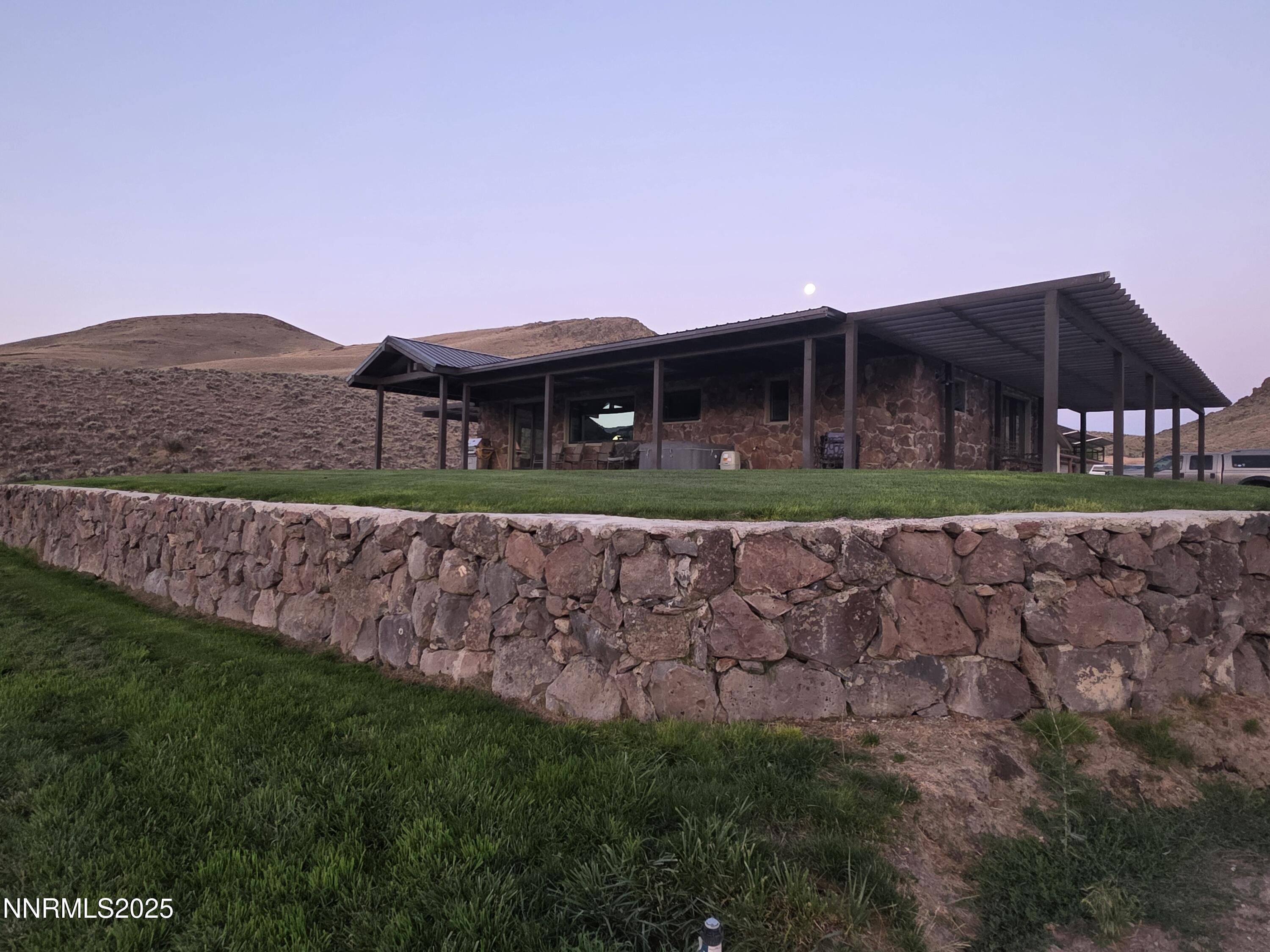 3300 High Rock Road Gerlach, NV 89412 - Photo 37 of 57 a front view of a house with a yard