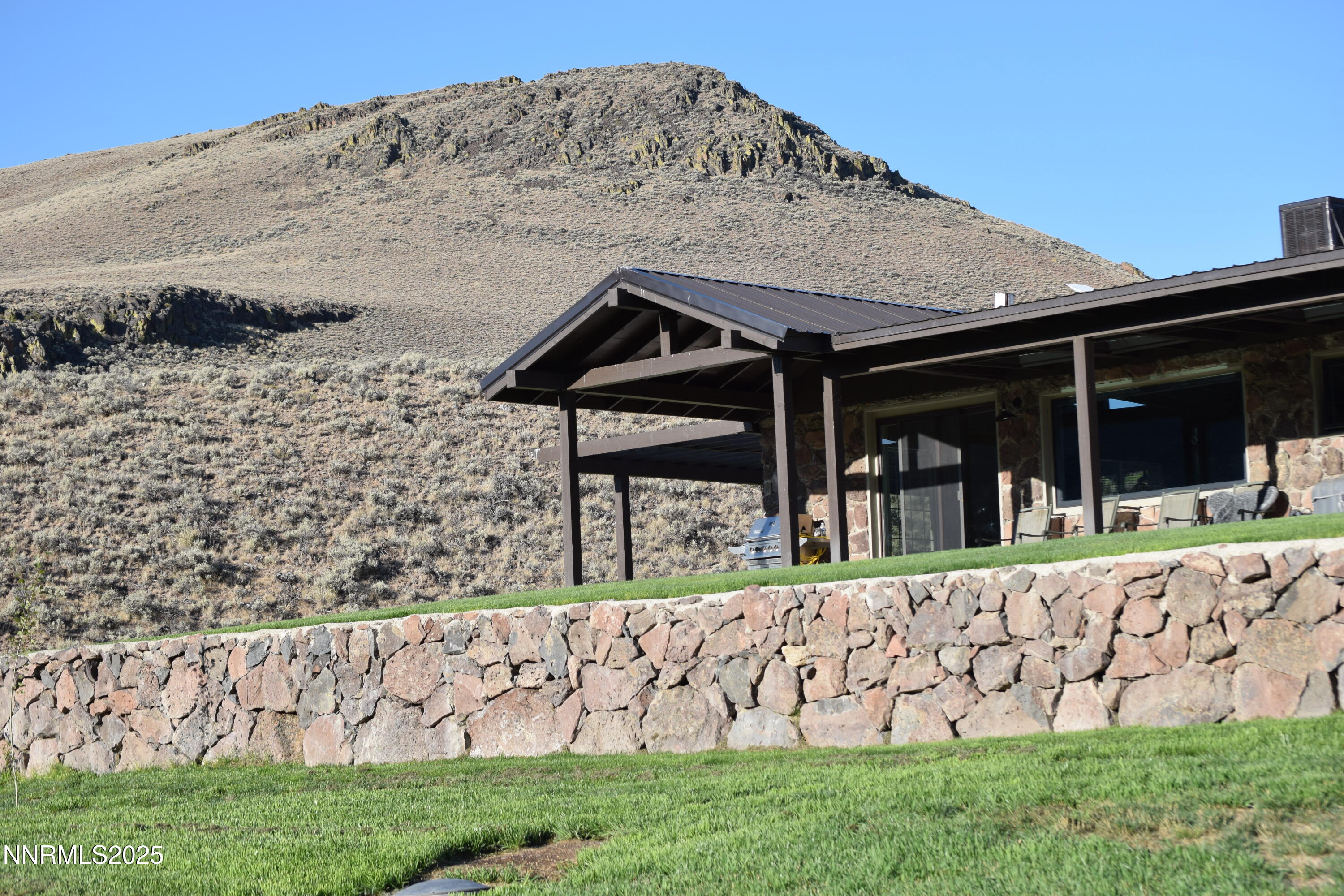 3300 High Rock Road Gerlach, NV 89412 - Photo 38 of 57 a front view of a house with a garden
