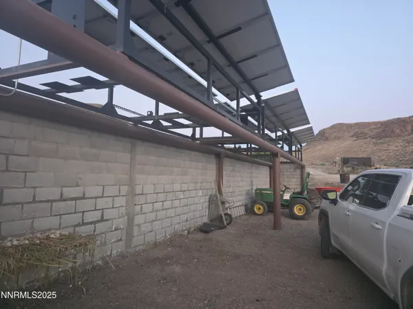 a view of a pathway with a yard