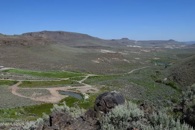 a view of a lake with a mountain