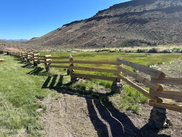 a view of a road with an ocean view