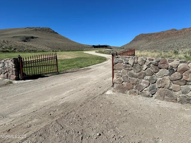 a view of a yard with an ocean