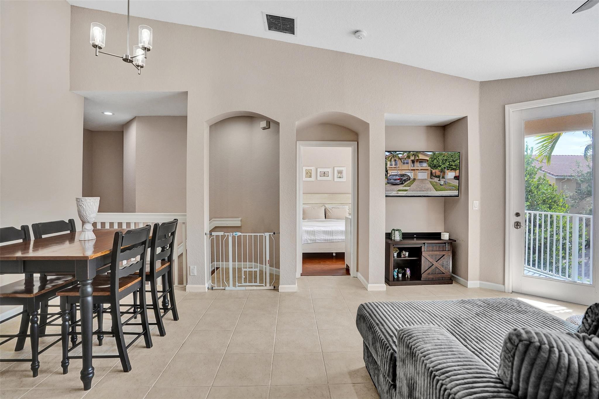 1825 Sonrisa Street Riviera Beach, FL 33404 - Photo 15 of 50 a view of a livingroom with furniture and a window