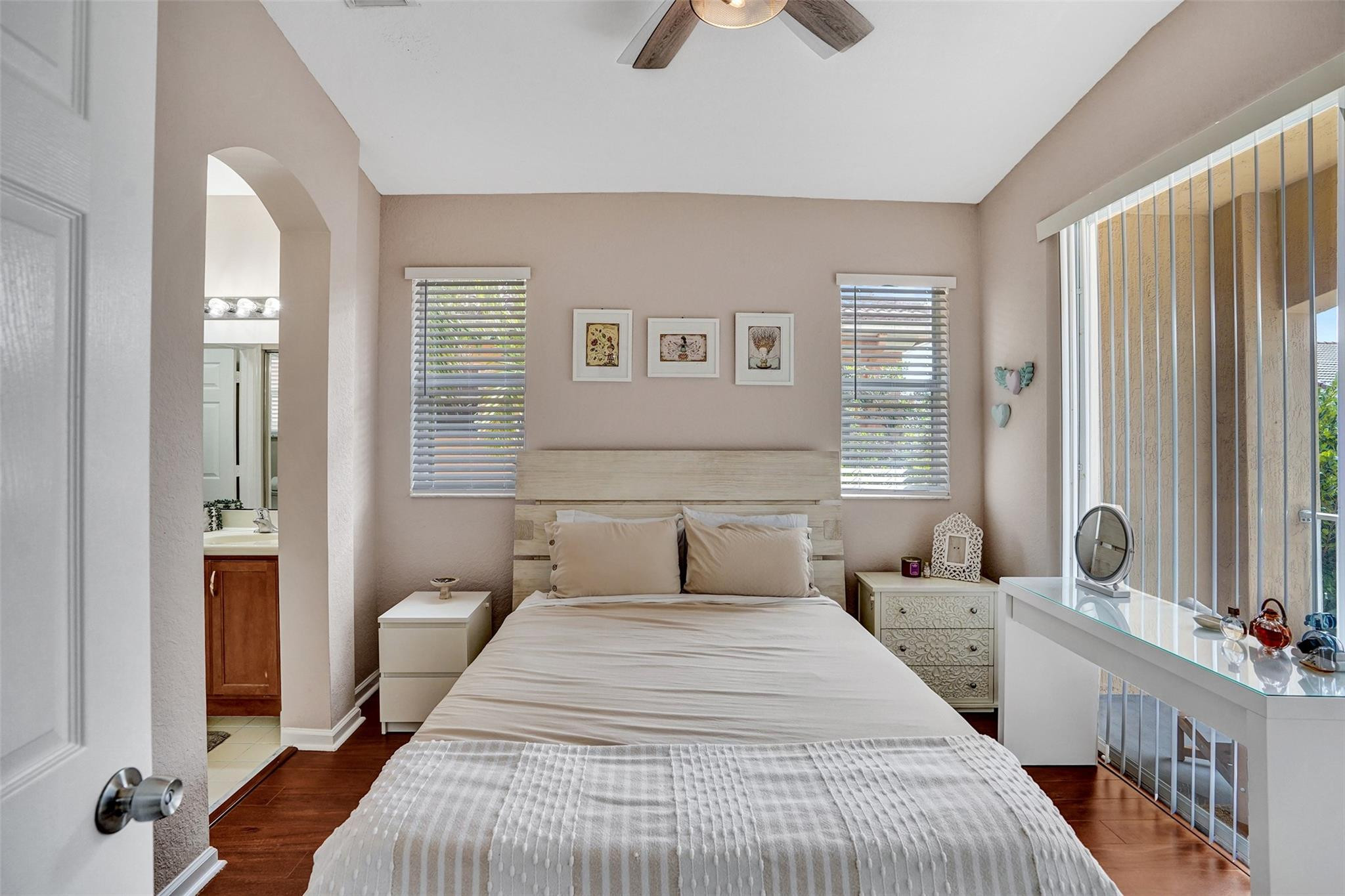 1825 Sonrisa Street Riviera Beach, FL 33404 - Photo 16 of 50 a bedroom with double bed and a window