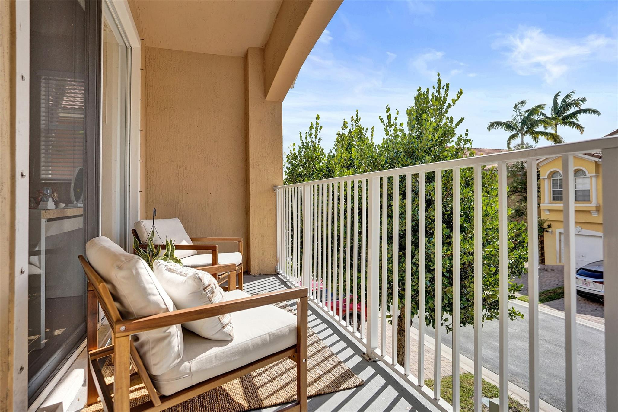 1825 Sonrisa Street Riviera Beach, FL 33404 - Photo 25 of 50 a view of balcony and patio