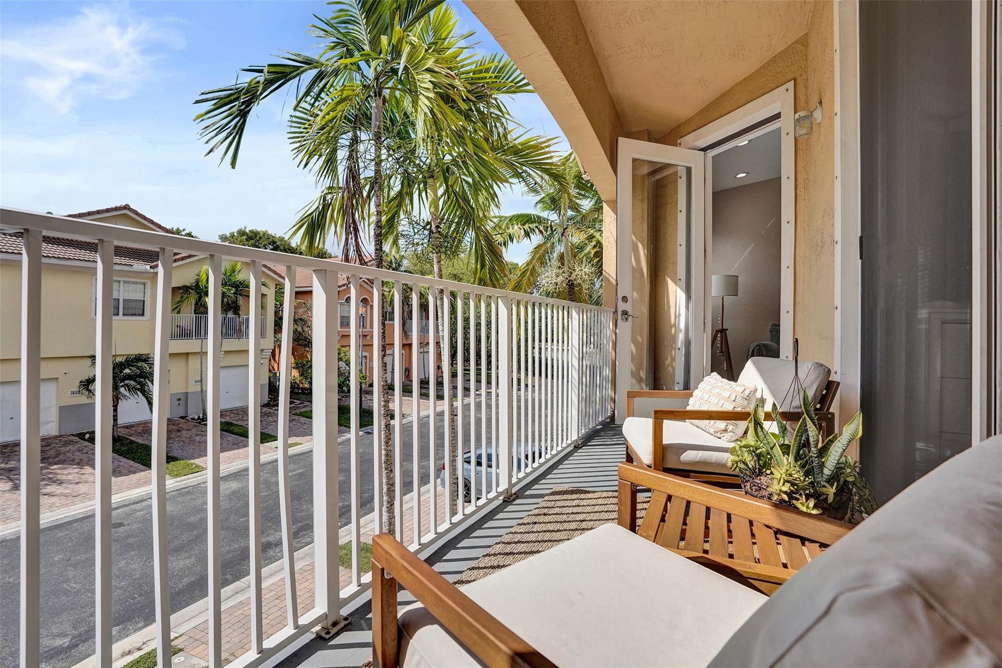 1825 Sonrisa Street Riviera Beach, FL 33404 - Photo 26 of 50 a view of balcony with wooden floor