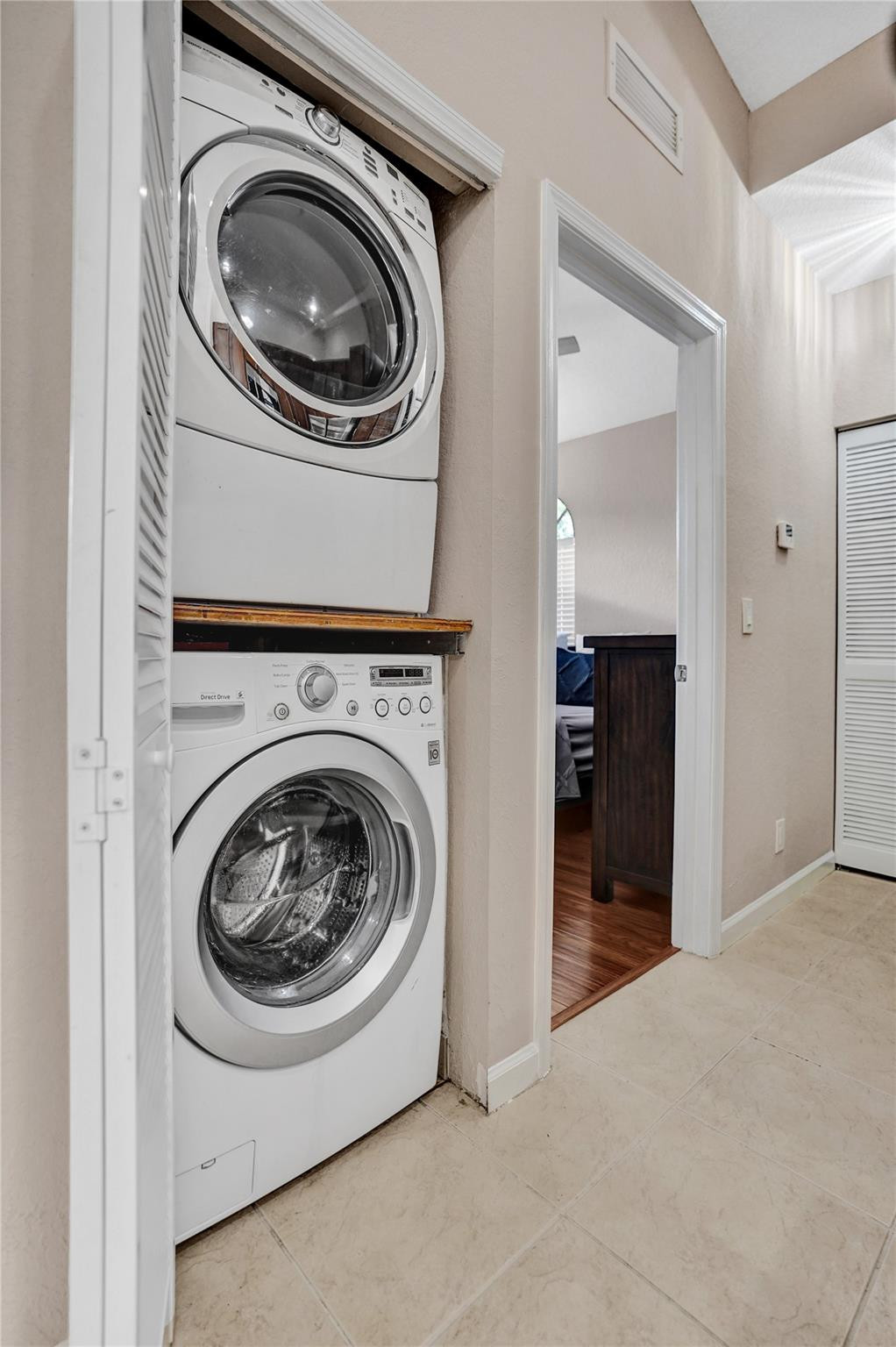 1825 Sonrisa Street Riviera Beach, FL 33404 - Photo 30 of 50 a utility room with dryer and washer