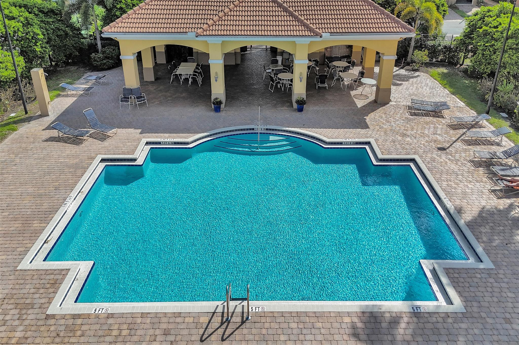 1825 Sonrisa Street Riviera Beach, FL 33404 - Photo 37 of 50 swimming pool view with a outdoor seating