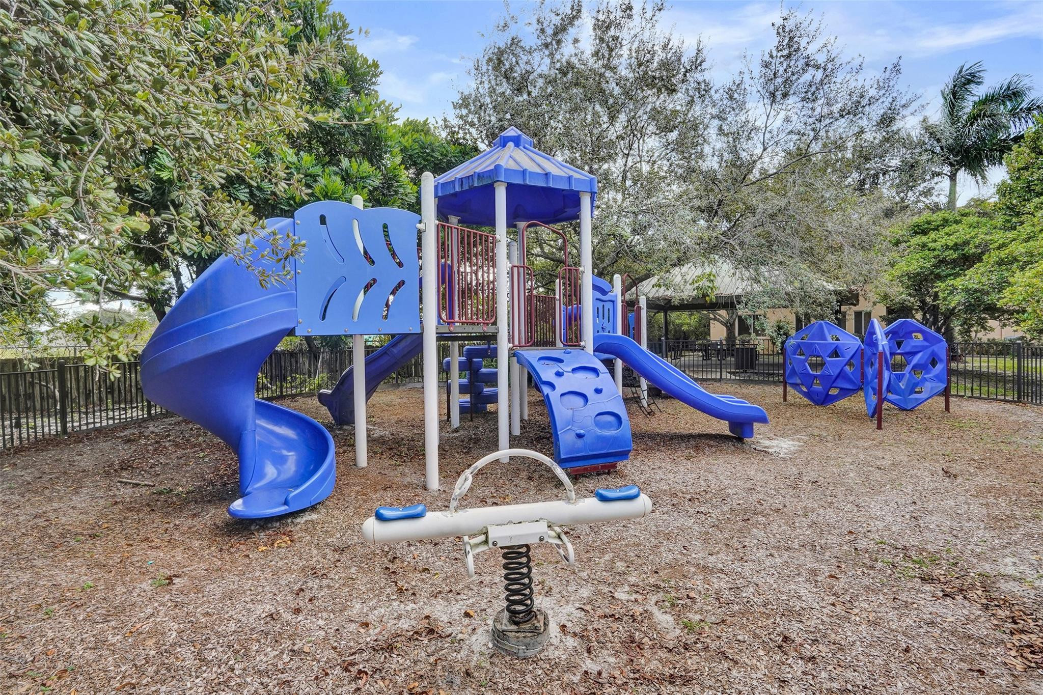1825 Sonrisa Street Riviera Beach, FL 33404 - Photo 47 of 50 a view of a wooden house with a space and porch