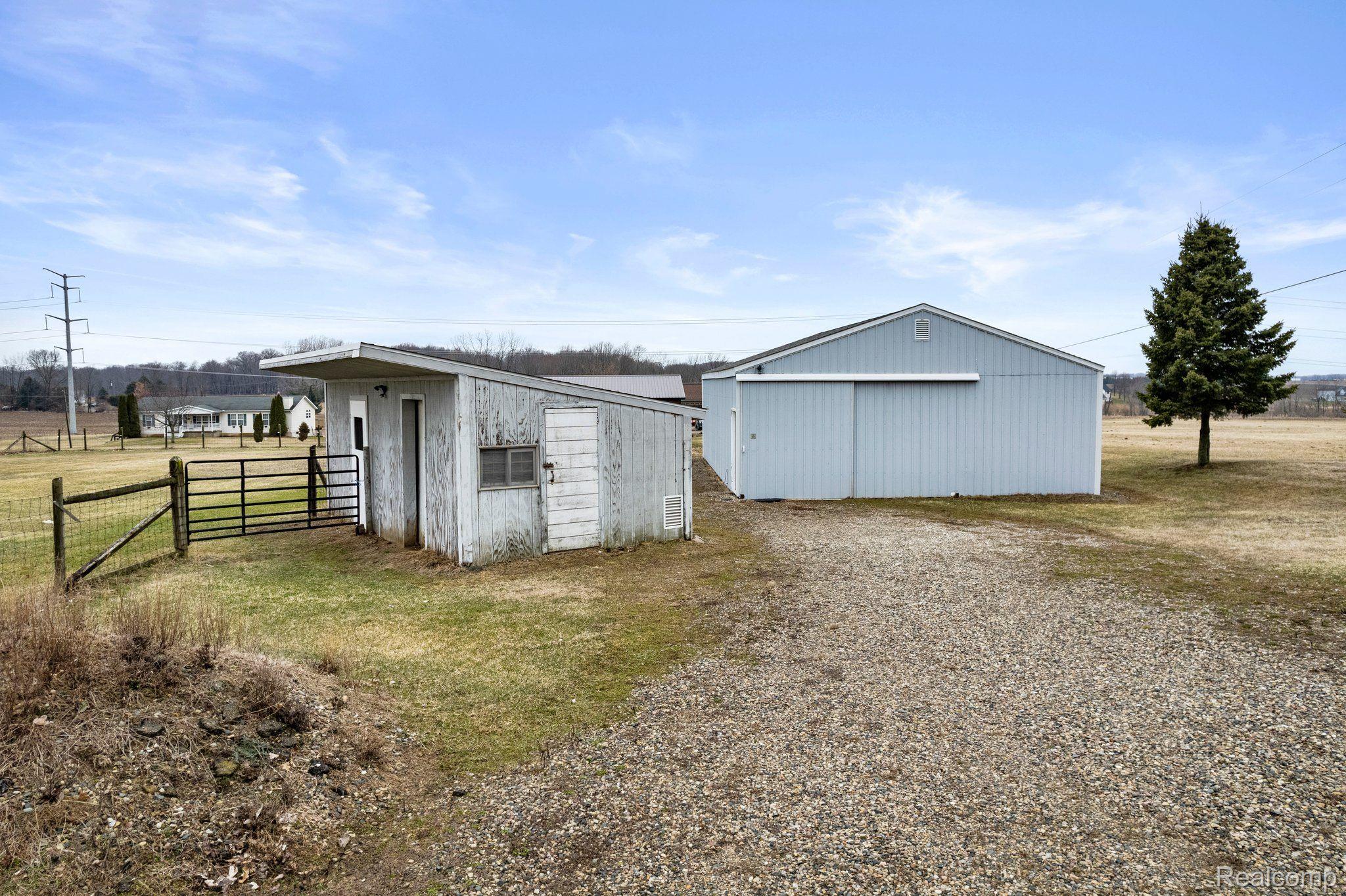 320 South Truhn Road Fowlerville, MI 48836 - Photo 13 of 35 Barn #2 with Lean too for storage or animals