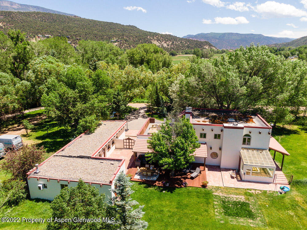 2459 Emma Road Basalt, CO 81621 - Photo 4 of 31 an aerial view of a house with a yard
