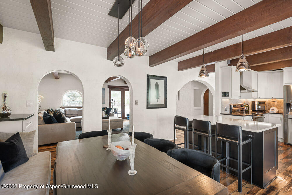 2459 Emma Road Basalt, CO 81621 - Photo 5 of 31 a living room with fireplace furniture and a kitchen view