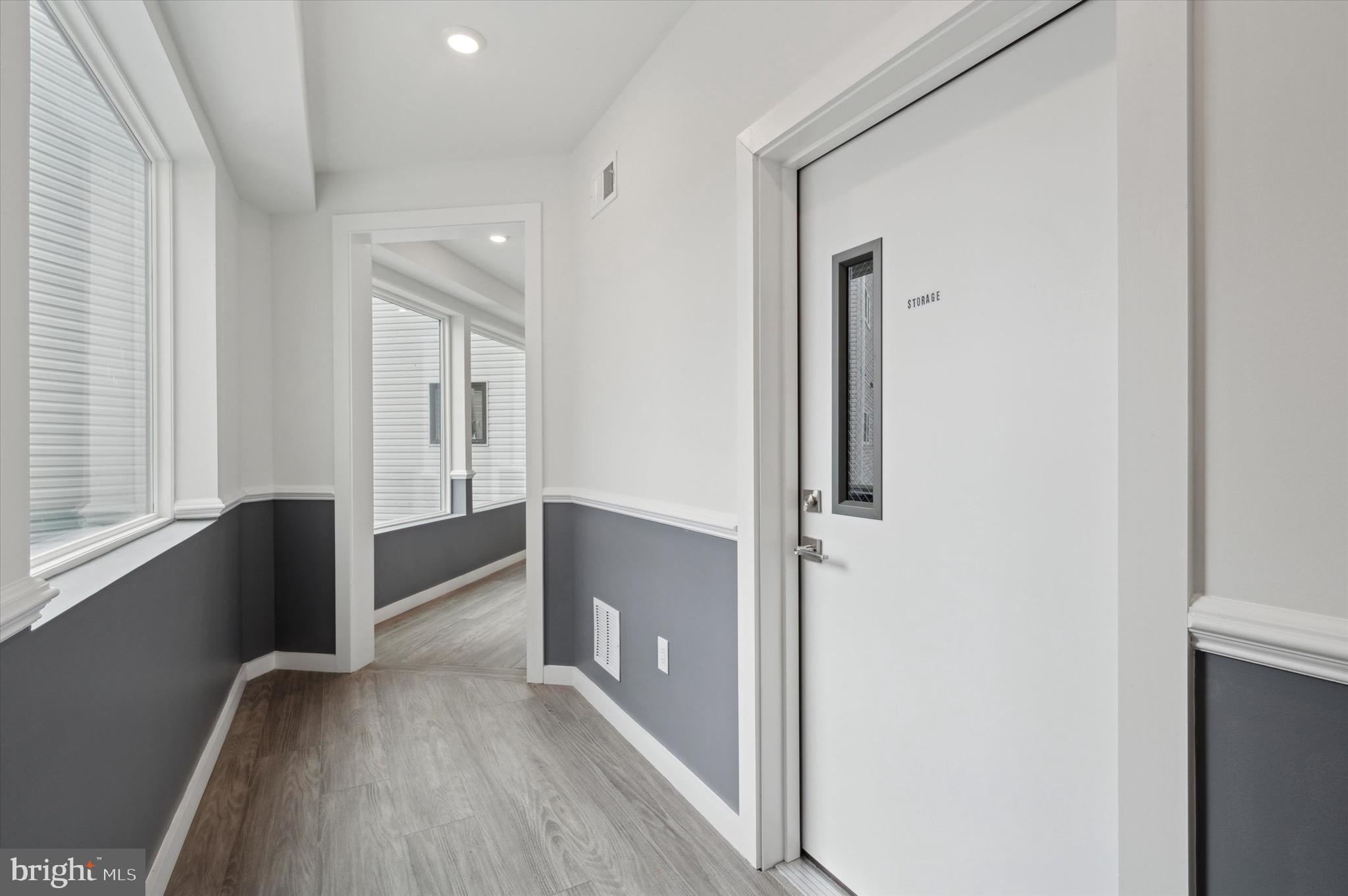1617-19 Ridge Avenue, Unit K Philadelphia, PA 19130 - Photo 14 of 15 a view of hallway with wooden floor
