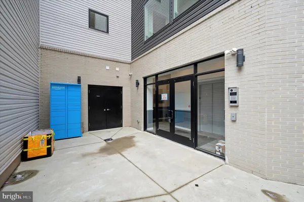a view of a lounge chair in front of a building