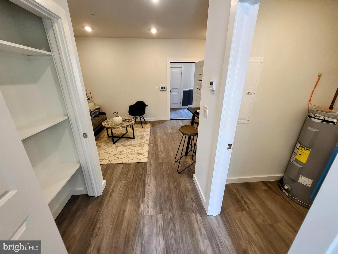1617-19 Ridge Avenue, Unit K Philadelphia, PA 19130 - Photo 10 of 15 a view of living room with furniture and wooden floor