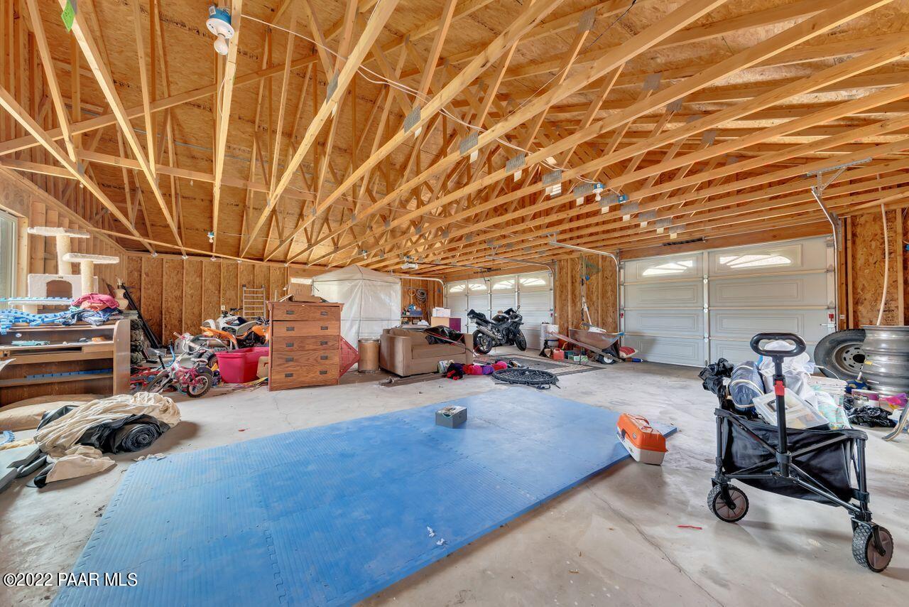 5755 West Rambling Road Prescott, AZ 86305 - Photo 21 of 22 a view of a garage with a bike and car
