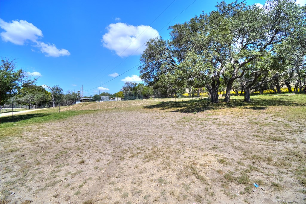 155 A Nimitz Road Kerrville, TX 78028 - Photo 3 of 17 a view of a field with trees