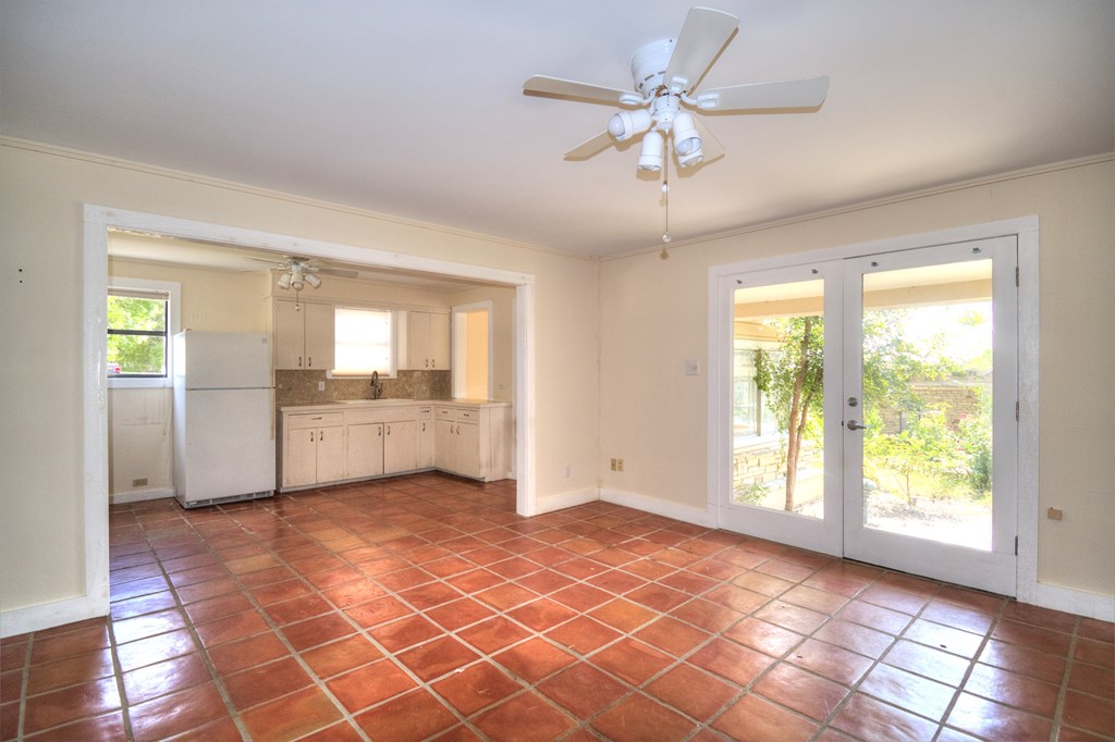 155 A Nimitz Road Kerrville, TX 78028 - Photo 4 of 17 a view of an empty room with a window