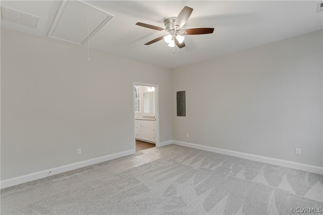 123 Carter Road Cumberland, VA 23040 - Photo 14 of 25 A view of the primary ensuite bath and spacious bedroom.