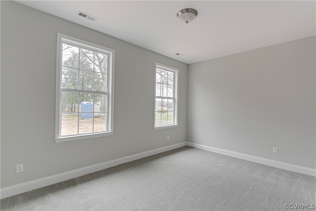 123 Carter Road Cumberland, VA 23040 - Photo 20 of 25 Bedroom three offers lots of light, and carpet.