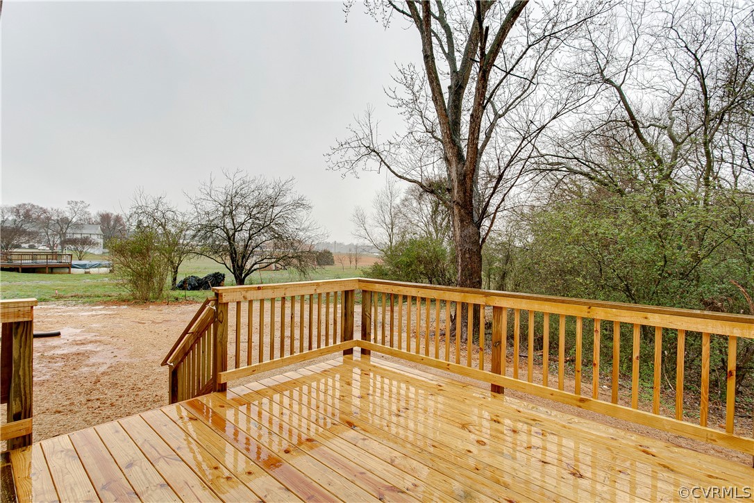 123 Carter Road Cumberland, VA 23040 - Photo 23 of 25 The deck is spacious with plenty of room to entertain guests or just relax.