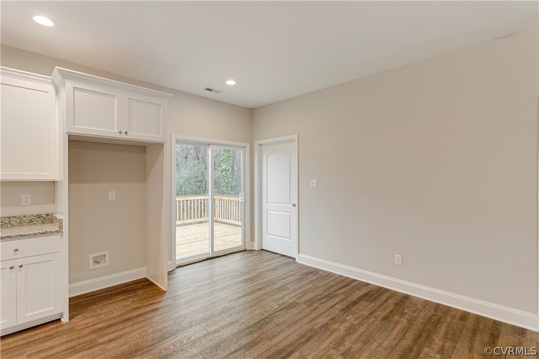 123 Carter Road Cumberland, VA 23040 - Photo 7 of 25 The dining area boasts recessed lighting and access to the large deck.