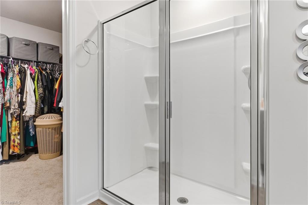 1702 Carter Daniel Drive Graham, NC 27253 - Photo 23 of 35 Primary Bathroom with large walk in closet