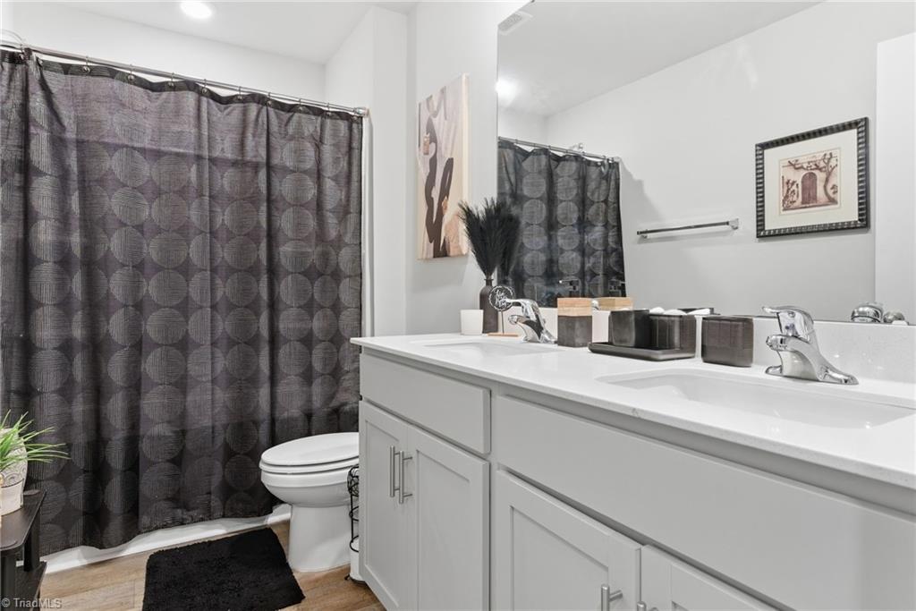 1702 Carter Daniel Drive Graham, NC 27253 - Photo 24 of 35 Upstairs Bathroom
