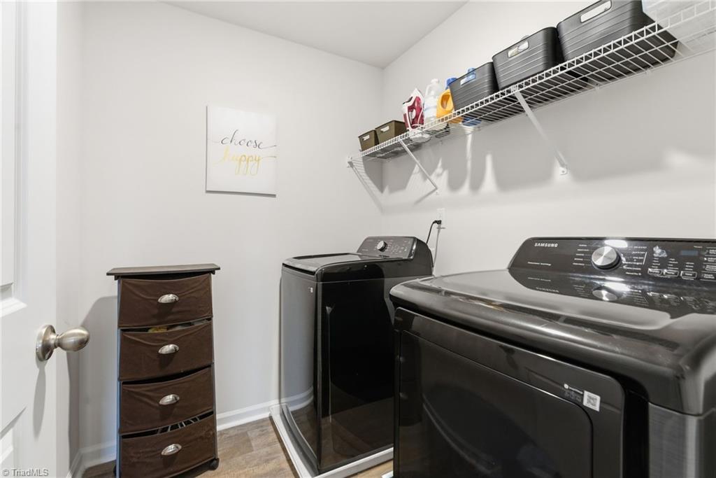 1702 Carter Daniel Drive Graham, NC 27253 - Photo 30 of 35 Upstairs laundry room with W/D