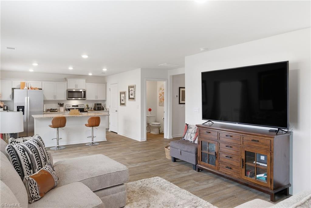 1702 Carter Daniel Drive Graham, NC 27253 - Photo 8 of 35 Living Room and Kitchen
