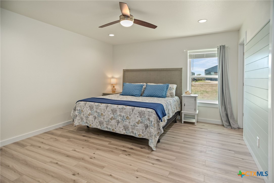 253 Carrie Street Port O'Connor, TX 77982 - Photo 11 of 33 Primary Bedroom on Main Floor with En-Suite Bathroom