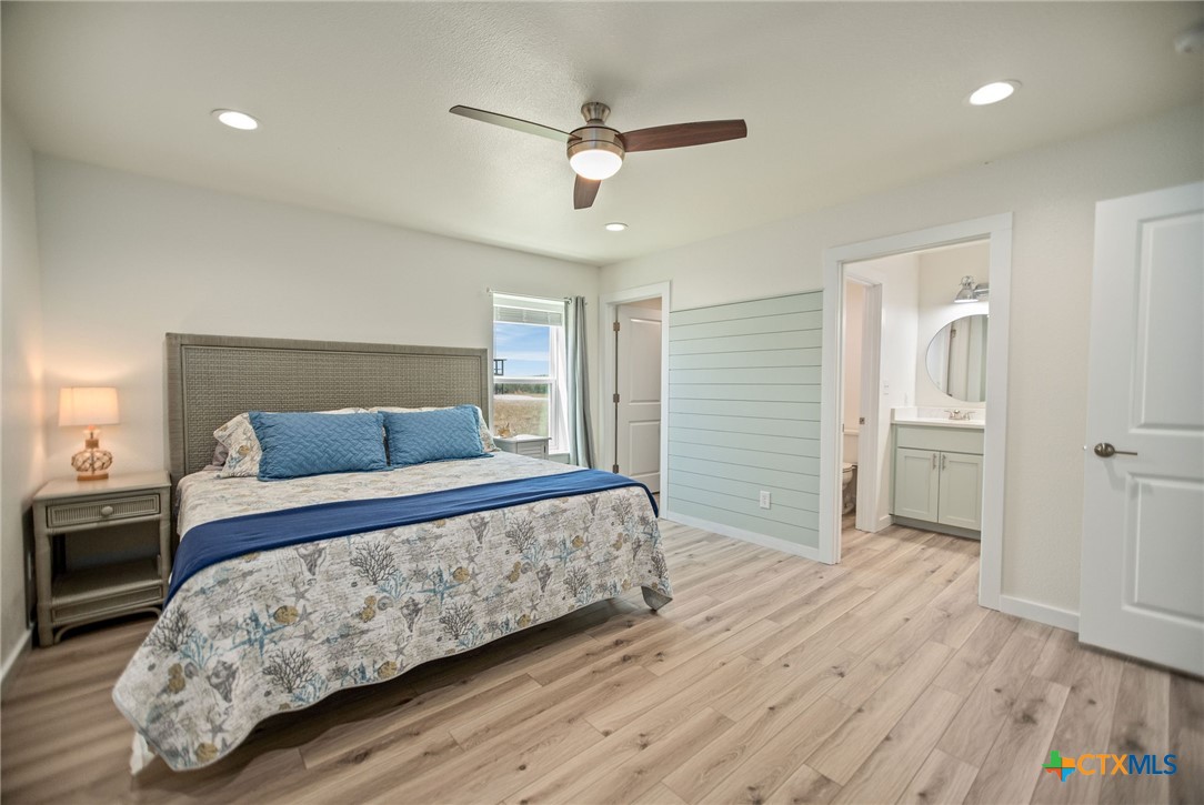 253 Carrie Street Port O'Connor, TX 77982 - Photo 12 of 33 Primary Bedroom on Main Floor with En-Suite Bathroom