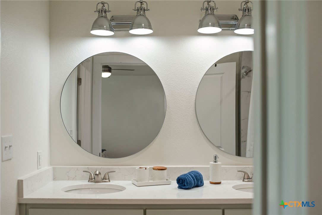 253 Carrie Street Port O'Connor, TX 77982 - Photo 14 of 33 Primary Bathroom with Double Vanity